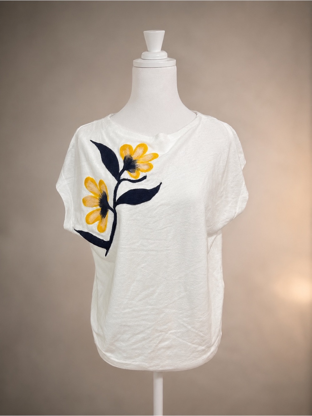 Women's White Short-Sleeve Tee with Yellow Floral Accent